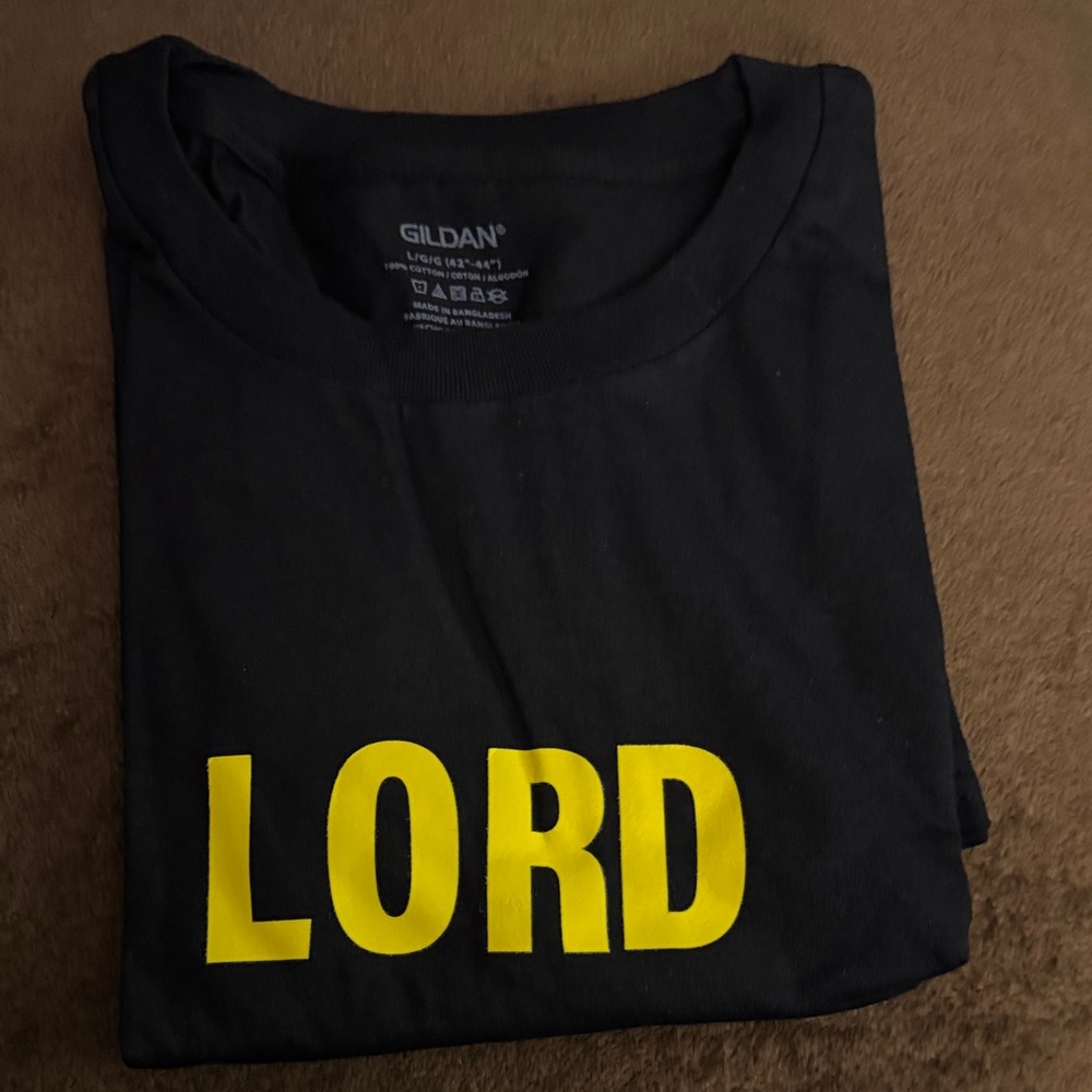 Black Tee with Bold Yellow Text